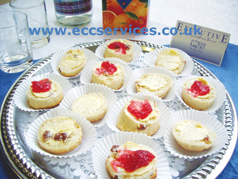 large photo of our cream and jam scones